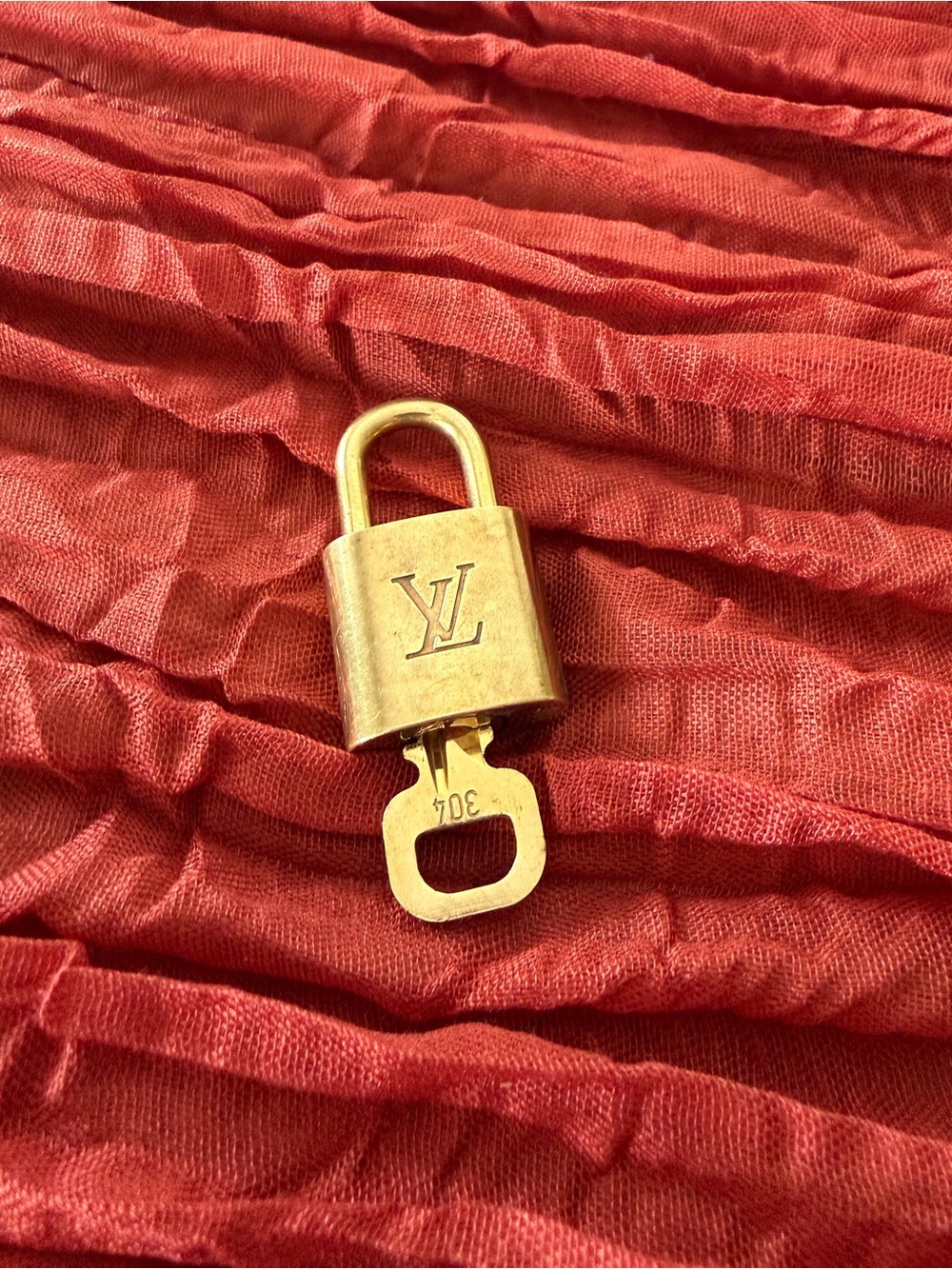 Louis Vuitton Gold Padlock and Key
